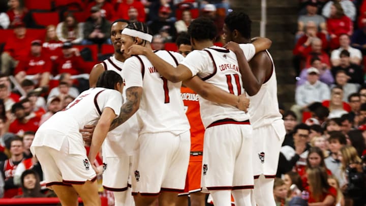 Jan 27, 2026; Raleigh, North Carolina, USA; NC State Wolfpack players huddle during the second half of the game against the Syracuse Orange at Lenovo Center. Mandatory Credit: Jaylynn Nash-Imagn Images
