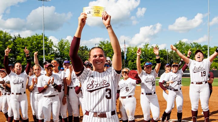 Mississippi State pitcher Peja Goold holds up her golden ticket to the AUSL College Draft this summer after another stellar performance against No. 20 LSU.