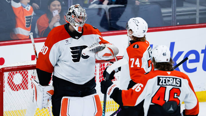 Apr 11, 2026; Winnipeg, Manitoba, CAN; Philadelphia Flyers goalie Dan Vladar (80) is congratulated by his teammates on his win against the Winnipeg Jets at the end of the third period at Canada Life Centre. Mandatory Credit: Terrence Lee-Imagn Images Apr 11, 2026; Winnipeg, Manitoba, CAN; Philadelphia Flyers goalie Dan Vladar (80) is congratulated by his teammates on his win against the Winnipeg Jets at the end of the third period at Canada Life Centre. Mandatory Credit: Terrence Lee-Imagn Images