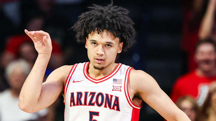 Feb 28, 2026; Tucson, Arizona, USA; Arizona Wildcats guard Brayden Burries (5) celebrates during the first half of the game against the Kansas Jayhawks at McKale Memorial Center. Mandatory Credit: Aryanna Frank-Imagn Images