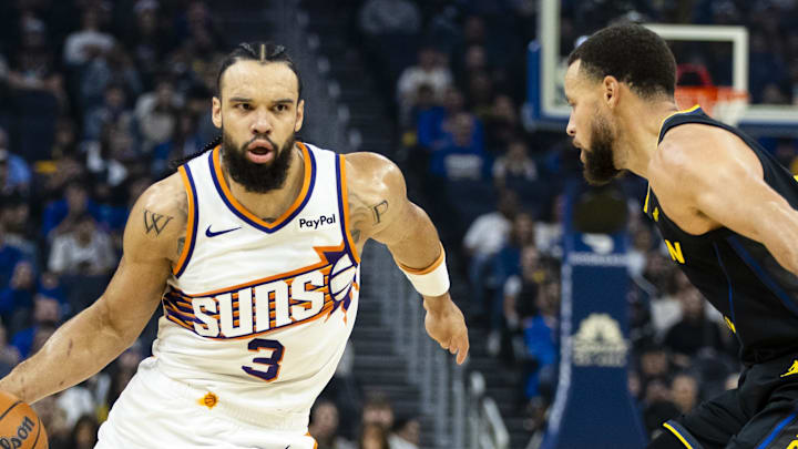Dec 20, 2025; San Francisco, California, USA; Phoenix Suns forward Dillon Brooks (3) drives past Golden State Warriors guard Stephen Curry (30) during the first quarter at Chase Center. Mandatory Credit: John Hefti-Imagn Images