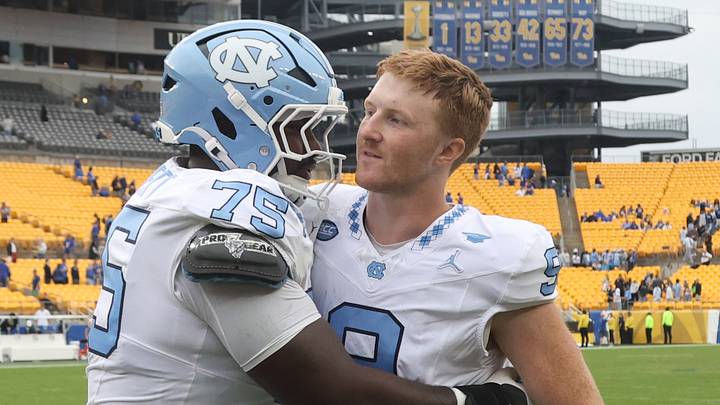 Oct 10, 2026; Pittsburgh, Pennsylvania, USA; North Carolina Tar Heels offensive lineman Andrew Threatt (75) and quarterback Billy Edwards Jr. (9) celebrate after defeating the Pittsburgh Panthers at Acrisure Stadium. Mandatory Credit: Charles LeClaire-Imagn Images Oct 10, 2026; Pittsburgh, Pennsylvania, USA; North Carolina Tar Heels offensive lineman Andrew Threatt (75) and quarterback Billy Edwards Jr. (9) celebrate after defeating the Pittsburgh Panthers at Acrisure Stadium. Mandatory Credit: Charles LeClaire-Imagn Images