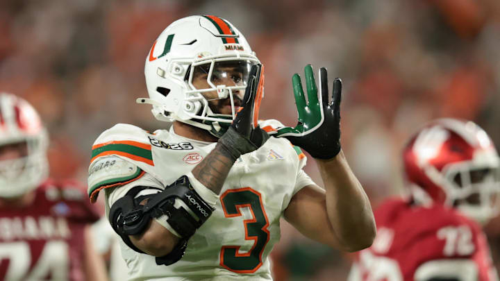 Miami Hurricanes defensive lineman Akheem Mesidor celebrates a sack against the Indiana Hoosiers in the national championship. Miami Hurricanes defensive lineman Akheem Mesidor celebrates a sack against the Indiana Hoosiers in the national championship.