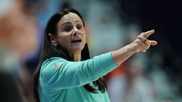 Aug 3, 2025; Uncasville, Connecticut, USA; New York Liberty head coach Sandy Brondello watches from the sideline as they take on the Connecticut Sun at Mohegan Sun Arena. Mandatory Credit: David Butler II-Imagn Images