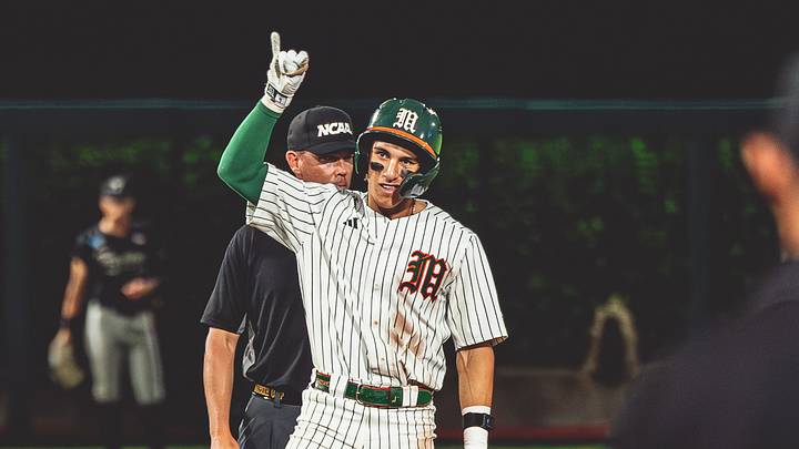 Miami second baseman Jake Ogden after a double against Troy in the Gainesville Regional.