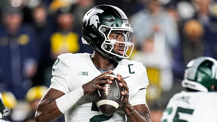 Michigan State quarterback Aidan Chiles (2) looks before making a pass against Michigan during the first half at Michigan Stadium in Ann Arbor on Saturday, Oct. 26, 2024. Michigan State quarterback Aidan Chiles (2) looks before making a pass against Michigan during the first half at Michigan Stadium in Ann Arbor on Saturday, Oct. 26, 2024.