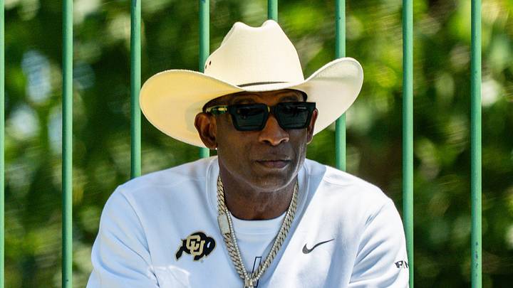 Deion Sanders takes in the second day of Cleveland Browns training camp, July 30, 2026, in Berea, Ohio. Deion Sanders takes in the second day of Cleveland Browns training camp, July 30, 2026, in Berea, Ohio.