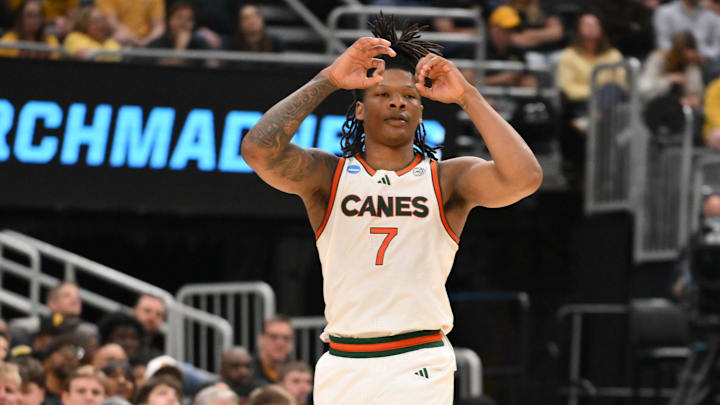 Mar 20, 2026; St. Louis, MO, USA; Miami (FL) Hurricanes forward Shelton Henderson (7) reacts after a three point shot play during the second half against Missouri Tigers during a first round game of the men's 2026 NCAA Tournament at Enterprise Center. Mandatory Credit: Jeff Curry-Imagn Images