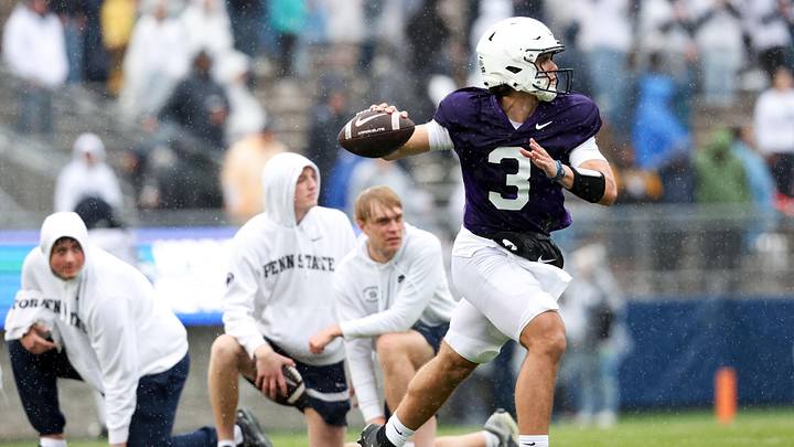 Penn State Nittany Lions quarterback Rocco Becht looks to throw a pass on the run during the Blue-White Spring Practice at Beaver Stadium. 