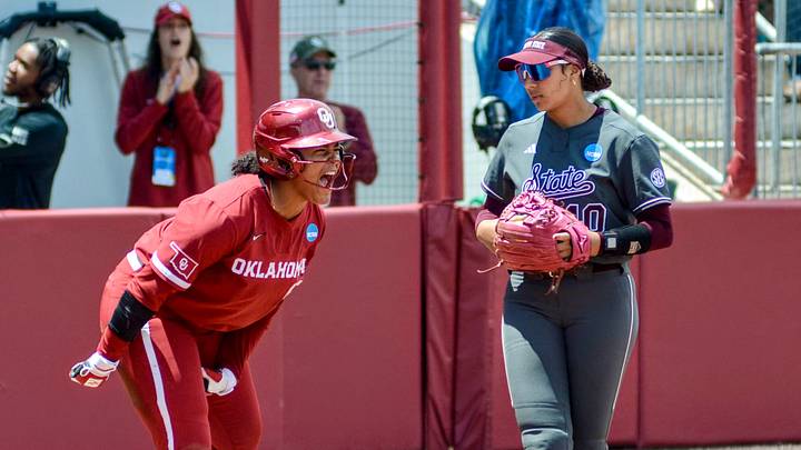 Oklahoma right fielder Ella Parker roars during a contest against Mississippi State in the Norman Super Regional. Oklahoma right fielder Ella Parker roars during a contest against Mississippi State in the Norman Super Regional.