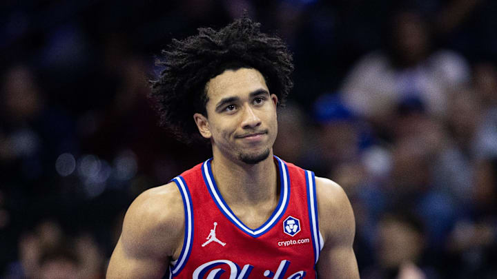 Nov 22, 2024; Philadelphia, Pennsylvania, USA; Philadelphia 76ers guard Jared McCain (20) reacts to his three pointer against the Brooklyn Nets during the first quarter at Wells Fargo Center. Mandatory Credit: Bill Streicher-Imagn Images