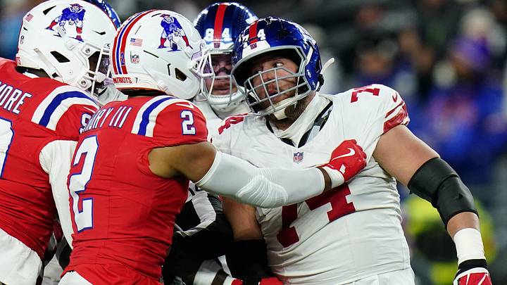 Dec 1, 2025; Foxborough, Massachusetts, USA; New England Patriots linebacker Harold Landry III (2) and New York Giants guard Greg Van Roten (74) push each other during the first quarter at Gillette Stadium. Mandatory Credit: David Butler II-Imagn Images Dec 1, 2025; Foxborough, Massachusetts, USA; New England Patriots linebacker Harold Landry III (2) and New York Giants guard Greg Van Roten (74) push each other during the first quarter at Gillette Stadium. Mandatory Credit: David Butler II-Imagn Images