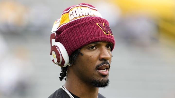 Sep 11, 2025; Green Bay, Wisconsin, USA; Washington Commanders quarterback Jayden Daniels (5) warms up before a game against the Green Bay Packers at Lambeau Field. Mandatory Credit: Jeff Hanisch-Imagn Images Sep 11, 2025; Green Bay, Wisconsin, USA; Washington Commanders quarterback Jayden Daniels (5) warms up before a game against the Green Bay Packers at Lambeau Field. Mandatory Credit: Jeff Hanisch-Imagn Images