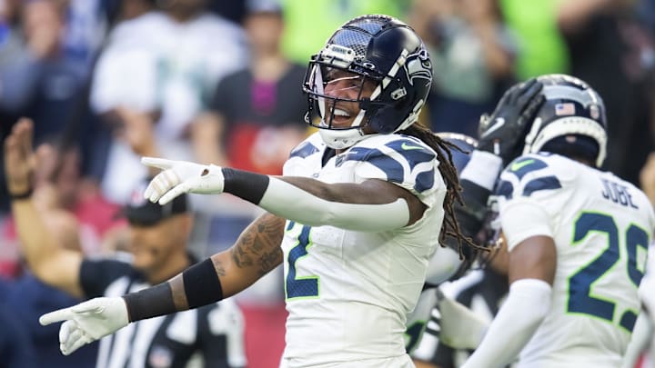 Dec 8, 2024; Glendale, Arizona, USA; Seattle Seahawks safety Rayshawn Jenkins (2) celebrates an interception against the Arizona Cardinals in the first half at State Farm Stadium. Dec 8, 2024; Glendale, Arizona, USA; Seattle Seahawks safety Rayshawn Jenkins (2) celebrates an interception against the Arizona Cardinals in the first half at State Farm Stadium.