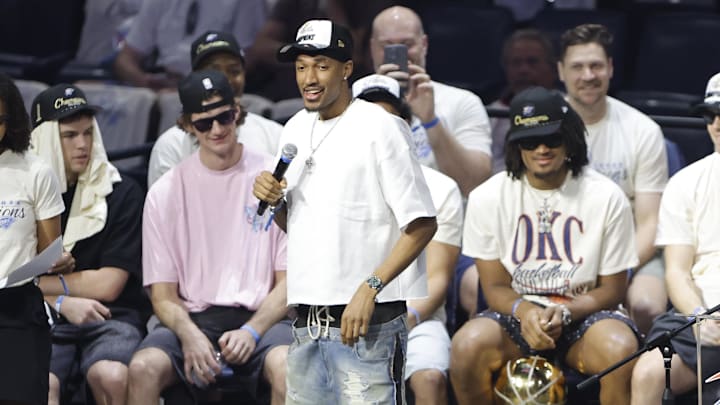 Jun 24, 2025; Oklahoma City, OK, USA; Oklahoma City Thunder guard Aaron Wiggins (21) speaks to fans during the Champions Opening Ceremony for the parade inside the Paycom Center. Mandatory Credit: Alonzo Adams-Imagn Images