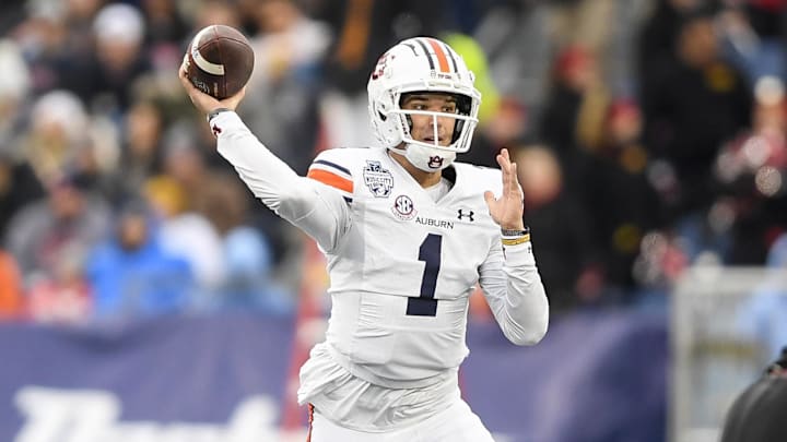 Dec 30, 2023; Nashville, TN, USA; Auburn Tigers quarterback Payton Thorne (1) throws a pass against the Maryland Terrapins during the first half at Nissan Stadium. Mandatory Credit: Steve Roberts-Imagn Images