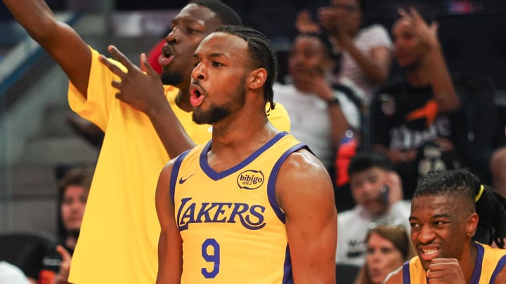 Jul 6, 2024; San Francisco, CA, USA; Los Angeles Lakers guard Bronny James Jr. (9) celebrates from the bench during the third quarter against the Sacramento Kings at Chase Center. Mandatory Credit: Kelley L Cox-USA TODAY Sports