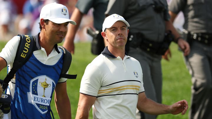 Rory McIlroy was defeated 1 up by Scottie Scheffler on Sunday at the Ryder Cup while enduring another day of taunting from fans.