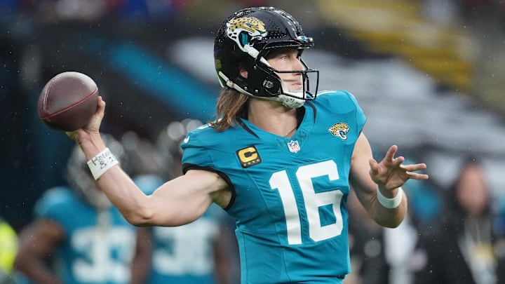 Oct 19, 2025; London, United Kingdom; Jacksonville Jaguars quarterback Trevor Lawrence (16) passes the ball against the Los Angeles Rams during the first half of an NFL International Series game at Wembley Stadium. Mandatory Credit: Kirby Lee-Imagn Images