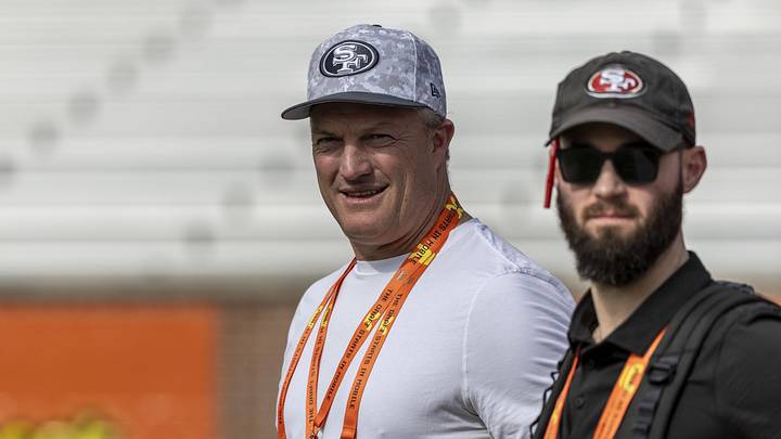 Mobile, AL, USA; San Francisco 49ers general manager John Lynch watches drills with San Francisco 49ers director of player personnel RJ Gillen during Senior Bowl practice for the American team at Hancock Whitney Stadium. Mandatory Credit: Vasha Hunt-Imagn Images