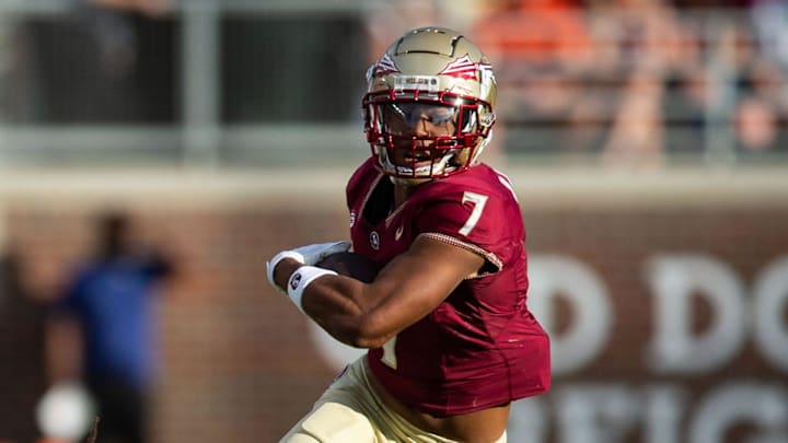Florida State Seminoles wide receiver Destyn Hill (7) attempts to outrun a tackle.The Florida State Seminoles defeated the Virginia Tech Hokies 39-17 at Doak Campbell Stadium on Saturday, Oct. 7, 2023.