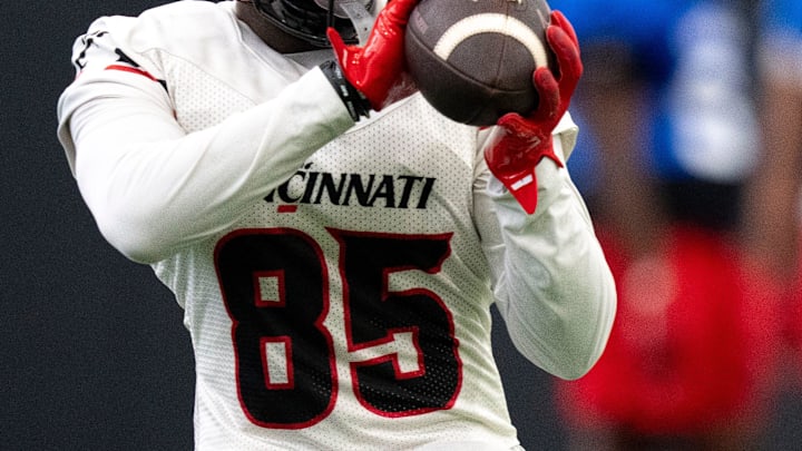 Cincinnati Bearcats tight end Lyviel Waters (85) catches a pass during football practice at Sheakley Athletic Performance Center in Cincinnati on Dec. 18, 2025.