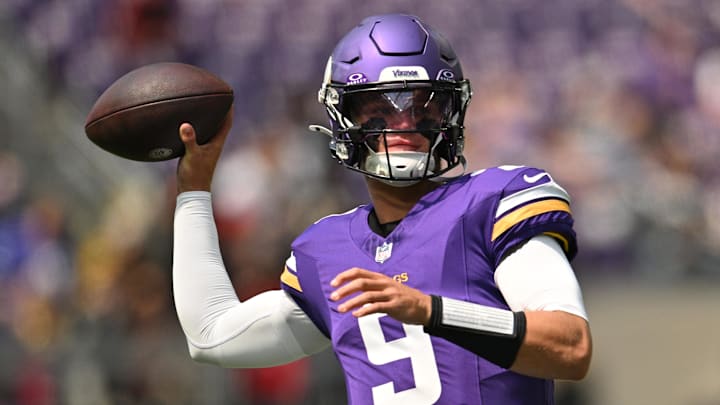 Minnesota Vikings quarterback J.J. McCarthy warms up for a game.