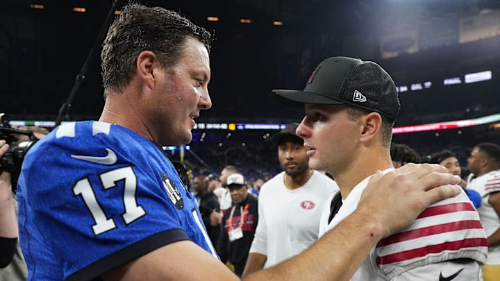 San Francisco 49ers quarterback Brock Purdy (R) and Indianapolis Colts quarterback Philip Rivers (L)