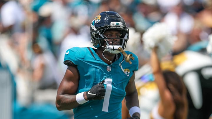 Sep 7, 2025; Jacksonville, Florida, USA; Jacksonville Jaguars running back Travis Etienne Jr. (1) takes the field prior to a game against the Carolina Panthers during the first half at EverBank Stadium. Mandatory Credit: Nathan Ray Seebeck-Imagn Images