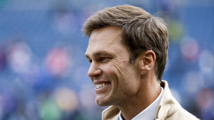 Oct 27, 2024; Seattle, Washington, USA; FOX commentator Tom Brady stands on the sideline before a game between the Seattle Seahawks and Buffalo Bills at Lumen Field. Mandatory Credit: Joe Nicholson-Imagn Images