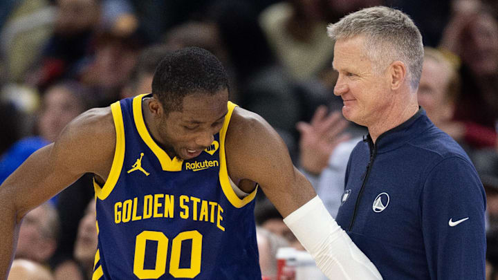 Jan 25, 2024; San Francisco, California, USA; Golden State Warriors forward Jonathan Kuminga (00) reacts after a foul with head coach Steve Kerr against the Sacramento Kings during the second quarter at Chase Center. Mandatory Credit: D. Ross Cameron-Imagn Images Jan 25, 2024; San Francisco, California, USA; Golden State Warriors forward Jonathan Kuminga (00) reacts after a foul with head coach Steve Kerr against the Sacramento Kings during the second quarter at Chase Center. Mandatory Credit: D. Ross Cameron-Imagn Images