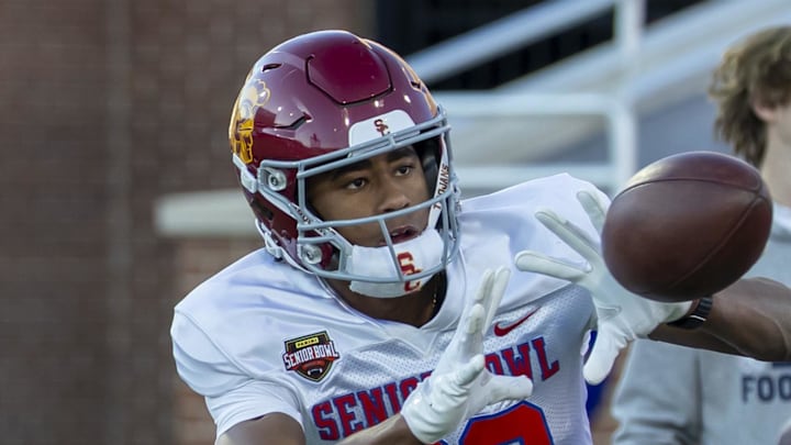 Jan 28, 2026; Mobile, AL, USA; American Team wide receiver Ja'kobi Lane (89) of USC works in passing drills during American Senior Bowl practice at Hancock Whitney Stadium. Mandatory Credit: Vasha Hunt-Imagn Images