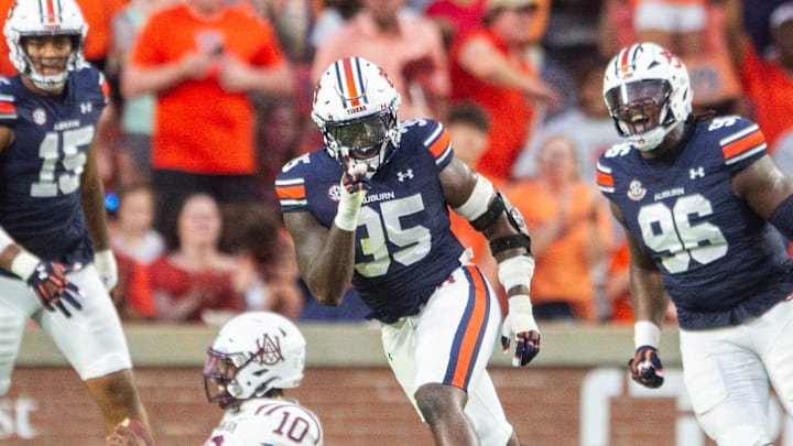 Auburn Tigers defensive lineman Jalen McLeod (35) celebrates his sack on Alabama A&M Bulldogs quarterback Cornelious Brown IV (10) as Auburn Tigers takes on Alabama A&M Bulldogs at Jordan-Hare Stadium in Auburn, Ala., on Saturday, Aug. 31, 2024.