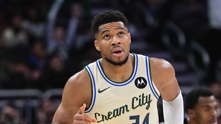 Nov 29, 2025; Milwaukee, Wisconsin, USA; Milwaukee Bucks forward Giannis Antetokounmpo (34) reacts after scoring his 21,000th career point in the third quarter against the Brooklyn Nets at Fiserv Forum.