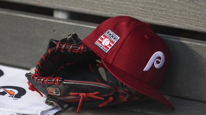 Jul 25, 2025; Bronx, New York, USA; A detailed view of a Hall of Fame patch on a Philadelphia Phillies hat resting in the dugout during the second inning against the New York Yankees at Yankee Stadium. 