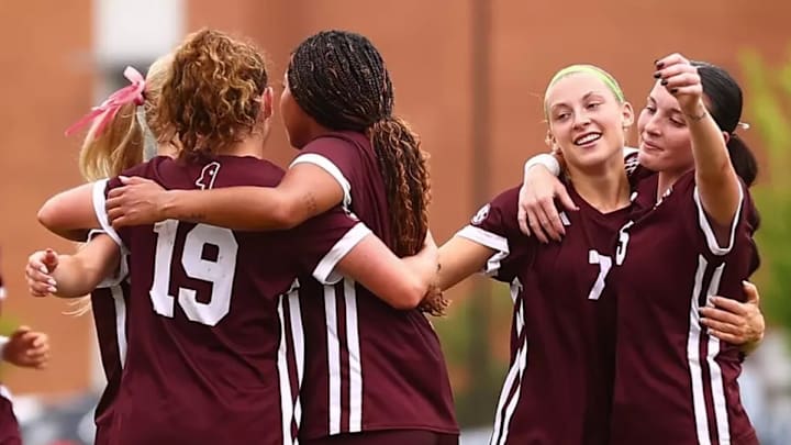 Mississippi State soccer players celebrate a goal scored in Saturday's exhibition match against Mercer.