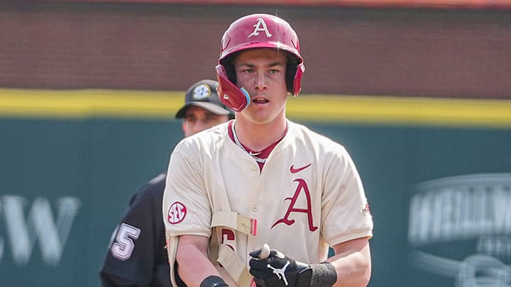 Gabe Fraser on the bases against Charlotte on March 2 for the Arkansas Razorbacks 
