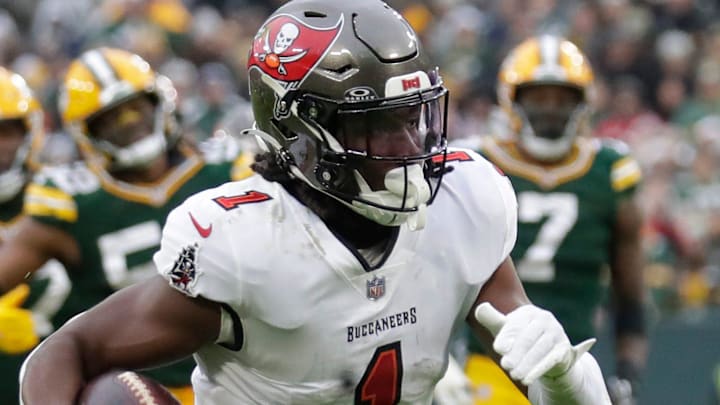Tampa Bay Buccaneers running back Rachaad White (1) breaks away for a touchdown against the Packers in 2023. Tampa Bay Buccaneers running back Rachaad White (1) breaks away for a touchdown against the Packers in 2023.