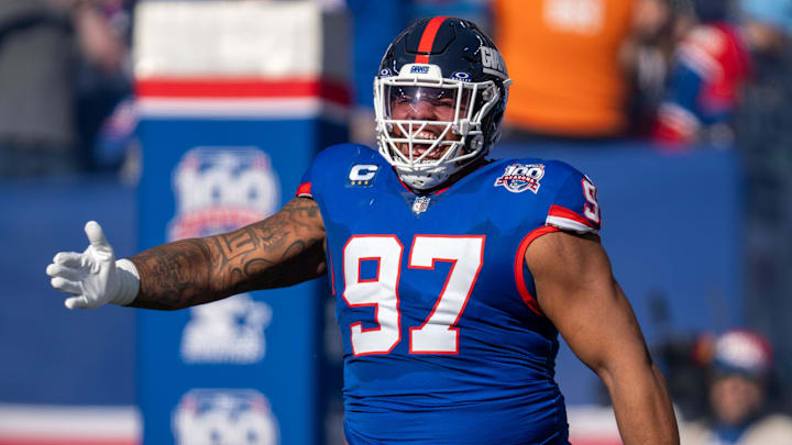 New York Giants defensive tackle Dexter Lawrence II (97) runs out of the tunnel prior to the start of the game between the New York Giants and the Washington Commanders at MetLife Stadium in East Rutherford on Sunday, Nov. 3, 2024.