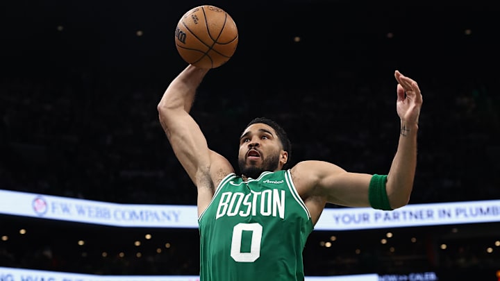 Mar 6, 2026; Boston, Massachusetts, USA; Boston Celtics forward Jayson Tatum (0) goes to the basket past Dallas Mavericks center Moussa Cisse (30) during the second quarter at TD Garden. Mandatory Credit: Winslow Townson-Imagn Images