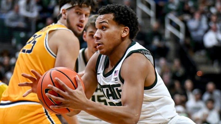 Michigan State's Divine Ugochukwu cuts to the basket on his way to a score against Toledo during the second half on Tuesday, Dec. 16, 2025, at the Breslin Center in East Lansing.