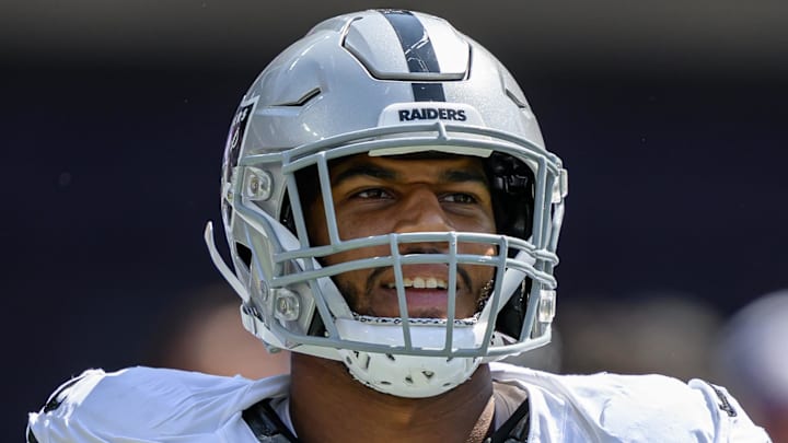 Sep 15, 2024; Baltimore, Maryland, USA; Las Vegas Raiders defensive end Charles Snowden (49) jogs on the field before the game against the Baltimore Ravens at M&T Bank Stadium. Mandatory Credit: Reggie Hildred-Imagn Images