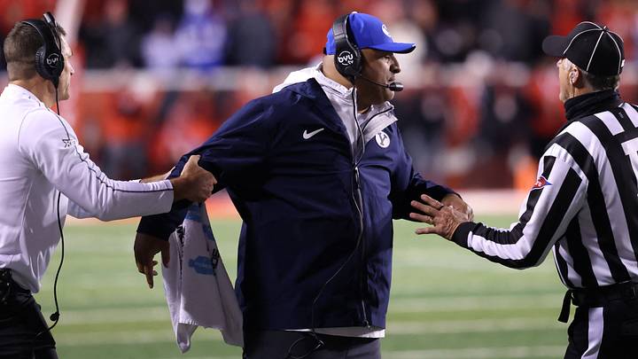 Nov 9, 2024; Salt Lake City, Utah, USA; Brigham Young Cougars head coach Kalani Sitake reacts after a call for the Utah Utes during the fourth quarter at Rice-Eccles Stadium. Mandatory Credit: Rob Gray-Imagn Images Nov 9, 2024; Salt Lake City, Utah, USA; Brigham Young Cougars head coach Kalani Sitake reacts after a call for the Utah Utes during the fourth quarter at Rice-Eccles Stadium. Mandatory Credit: Rob Gray-Imagn Images