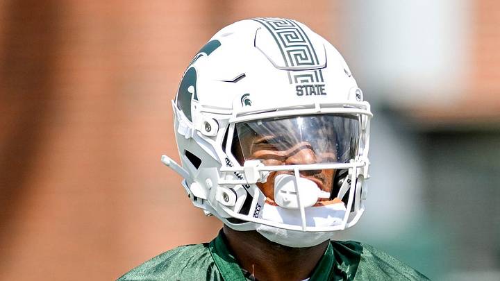 Michigan State's Montorie Foster Jr. runs after a catch during the first day of football camp Michigan State's Montorie Foster Jr. runs after a catch during the first day of football camp