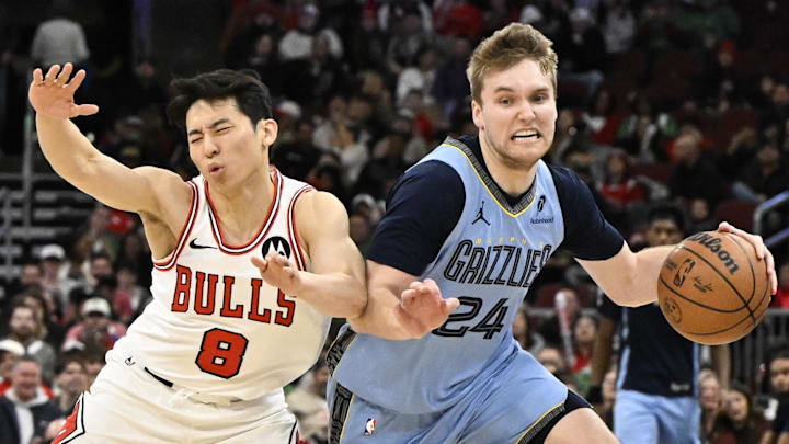Mar 16, 2026; Chicago, Illinois, USA; Chicago Bulls guard Yuki Kawamura (8) defends against Memphis Grizzlies guard Cam Spencer (24) during the second half at United Center. Mandatory Credit: Matt Marton-Imagn Images