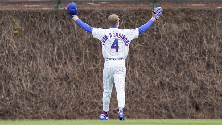 Chicago Cubs center fielder Pete Crow-Armstrong (4) waves to the crowd before playing the Arizona Diamondbacks at Wrigley Field. 