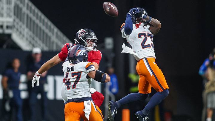 Denver Broncos cornerback Jahdae Barron (23) deflects a pass against the Atlanta Falcons in the second quarter at Mercedes-Benz Stadium. Denver Broncos cornerback Jahdae Barron (23) deflects a pass against the Atlanta Falcons in the second quarter at Mercedes-Benz Stadium.