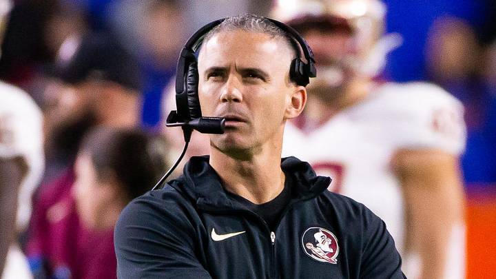 Florida State Seminoles head coach Mike Norvell looks to the replay screen at Steve Spurrier Field at Ben Hill Griffin Stadium in Gainesville, FL on Saturday, November 25, 2023 during the first half. [Doug Engle/Gainesville Sun]