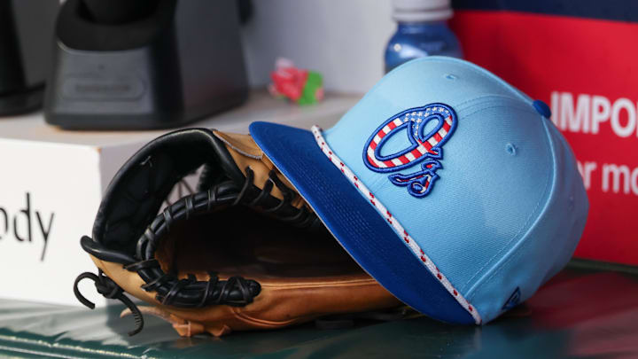 Jul 4, 2025; Atlanta, Georgia, USA; A detailed view of the Baltimore Orioles 4th of July hat in the dugout against the Atlanta Braves in the third inning at Truist Park. Jul 4, 2025; Atlanta, Georgia, USA; A detailed view of the Baltimore Orioles 4th of July hat in the dugout against the Atlanta Braves in the third inning at Truist Park.