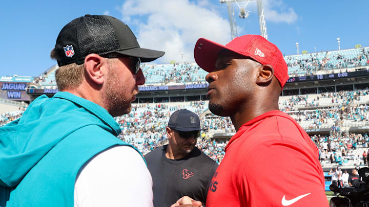 Sep 21, 2025; Jacksonville, Florida, USA; Jacksonville Jaguars head coach Liam Coen and Houston Texans head coach DeMeco Ryans shake hands after the game at EverBank Stadium. Mandatory Credit: Morgan Tencza-Imagn Images